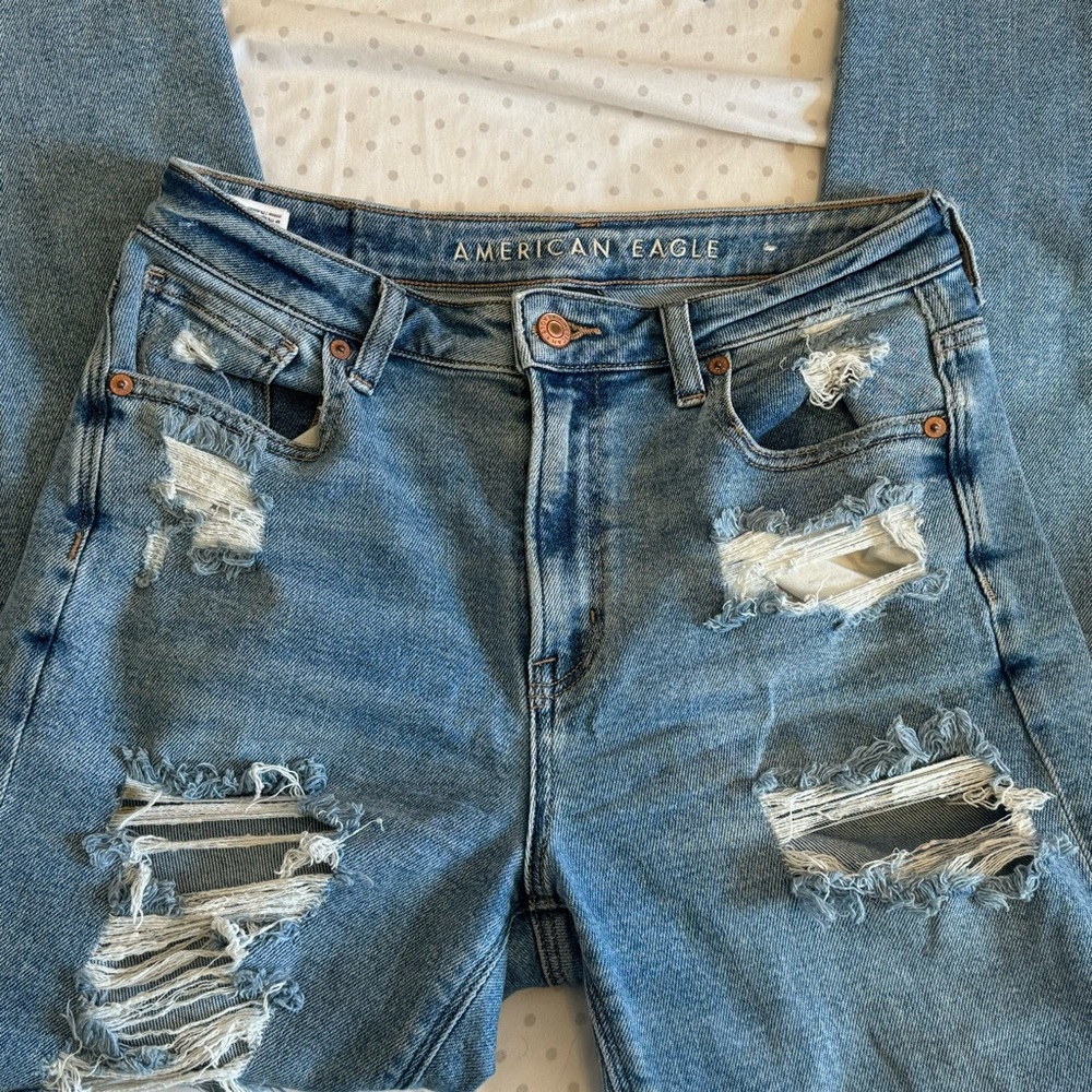 High waisted distressed jeans